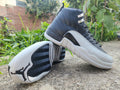 Air Jordan 12 Black and Light Gray Sneakers