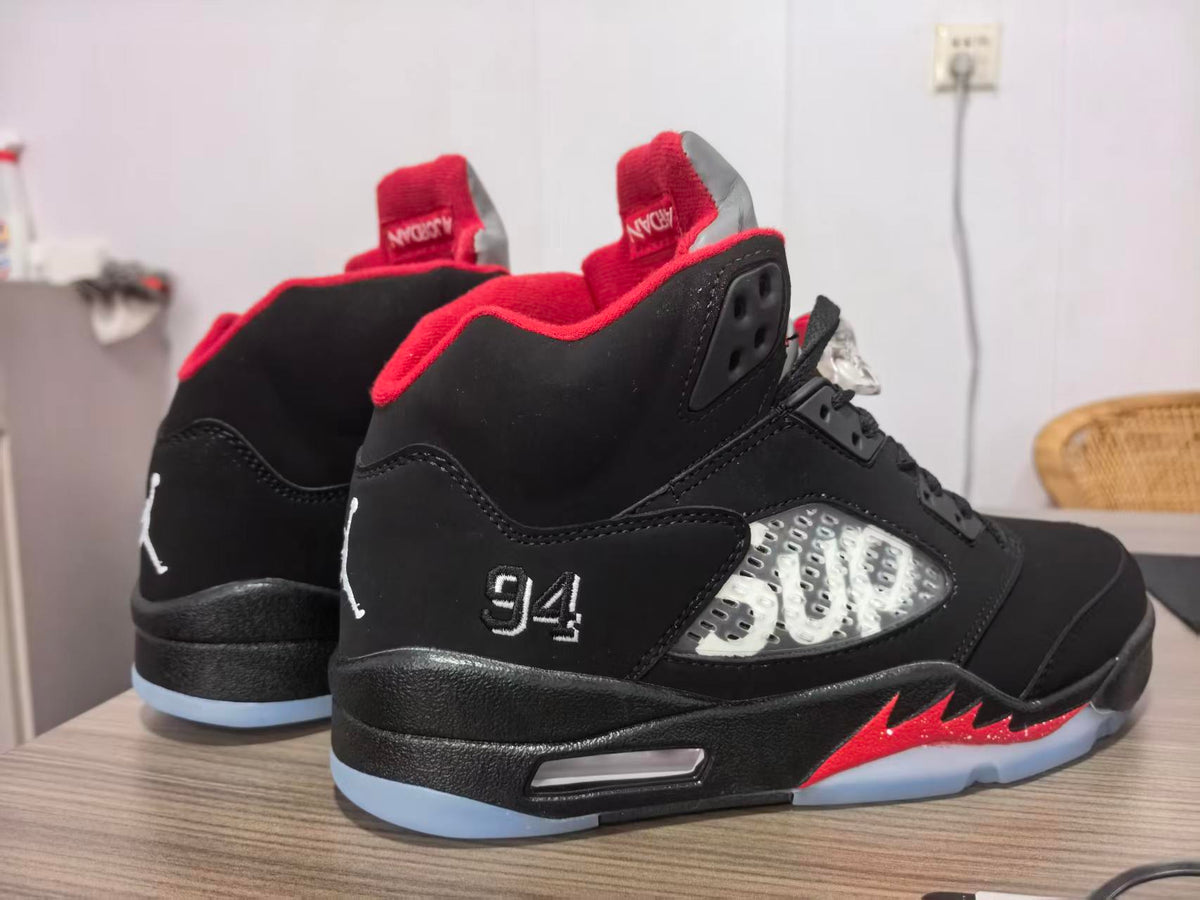 Air Jordan 5 Black and Red Collaboration Style Sneakers
