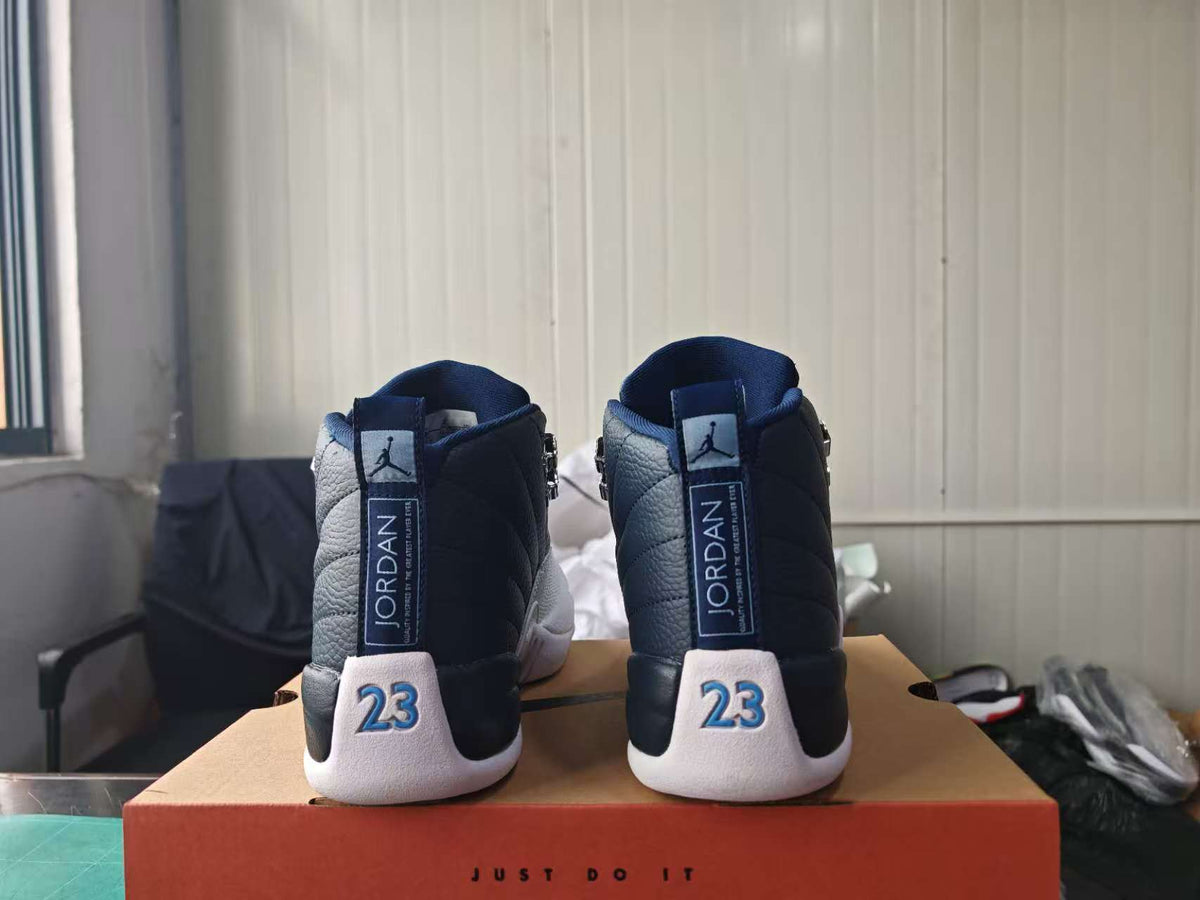 AJ12 Obsidian Sneakers