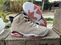 Air Jordan 6 Cream and Brown Sneakers