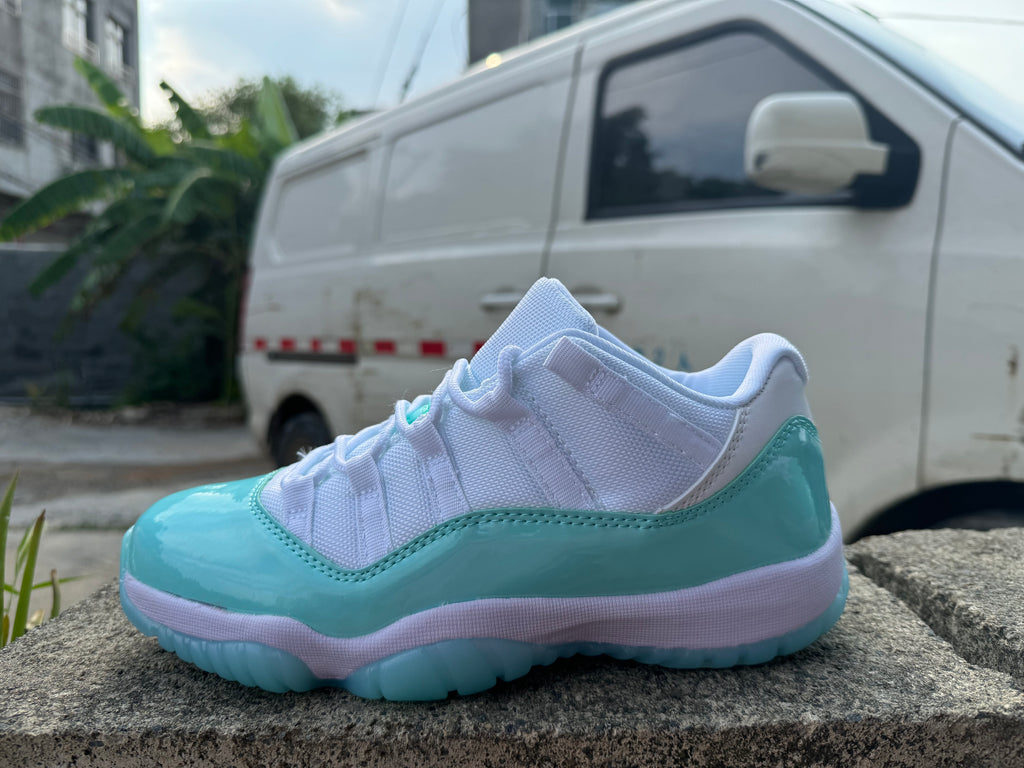 Air Jordan 11 White and Light Green Sneakers