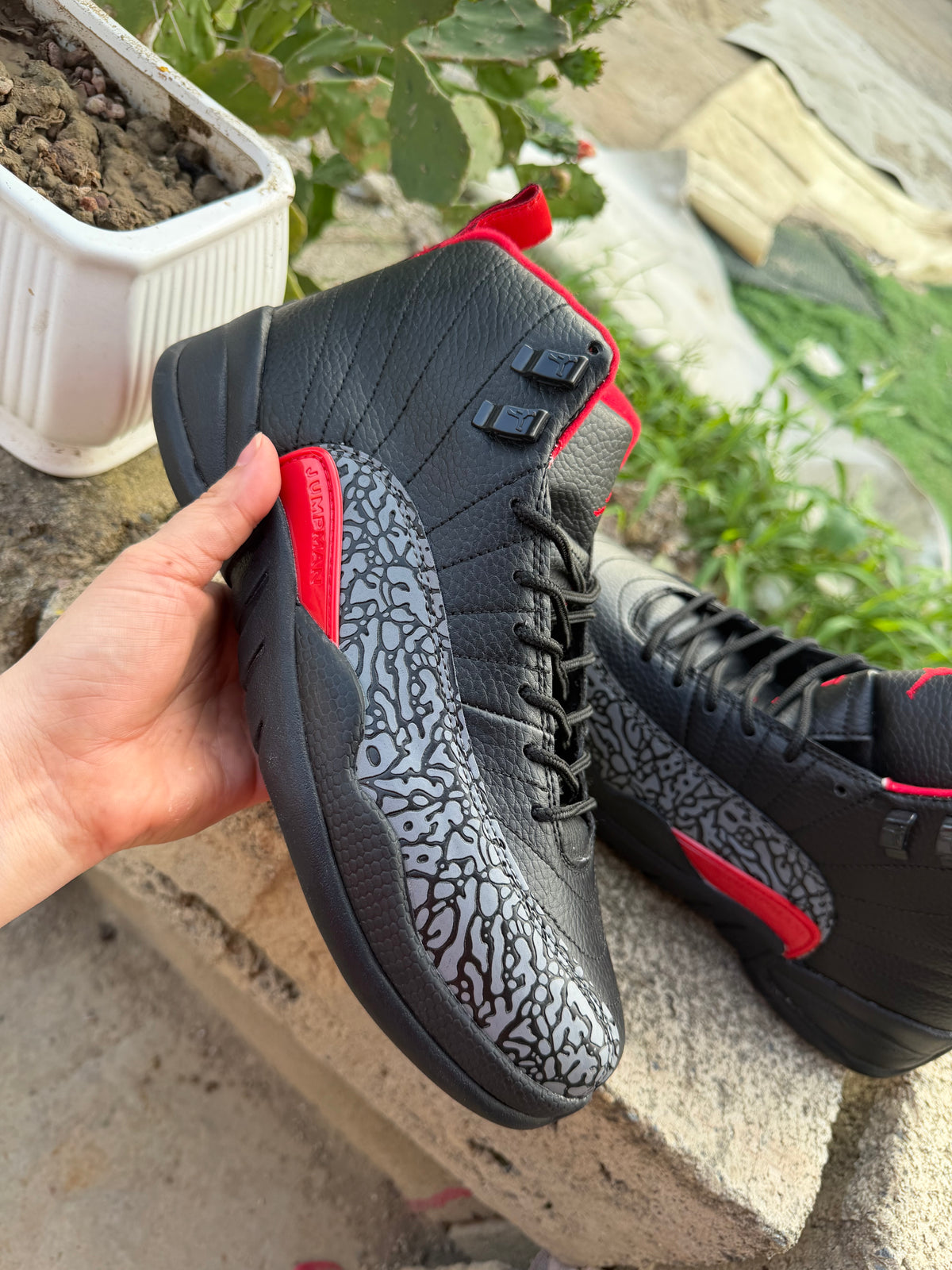 Air Jordan 12 Black Patterned Sneakers