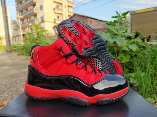 Air Jordan 11 Red and Black Sneakers