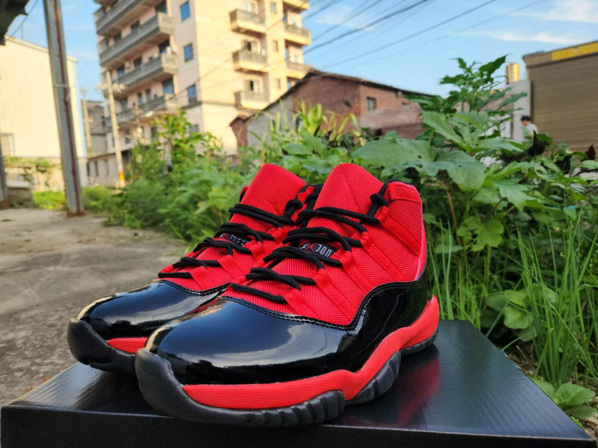 Air Jordan 11 Red and Black Sneakers