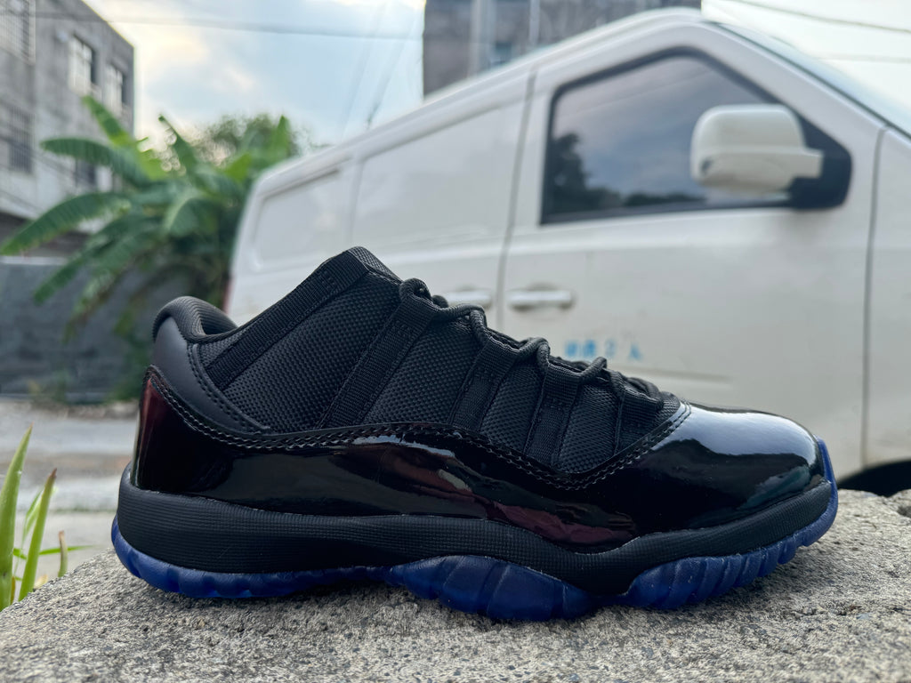Air Jordan 11 Black and Gamma Blue Sneakers