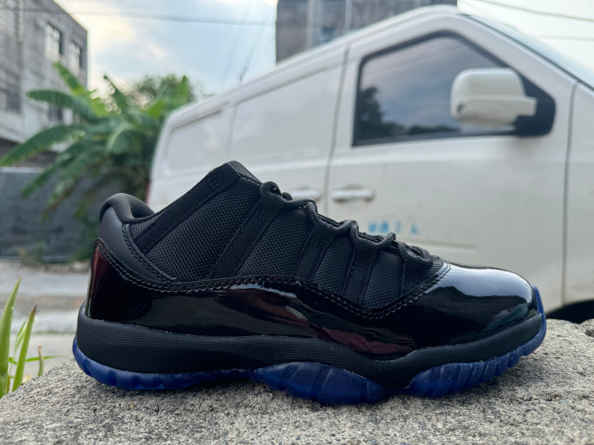Air Jordan 11 Black and Gamma Blue Sneakers
