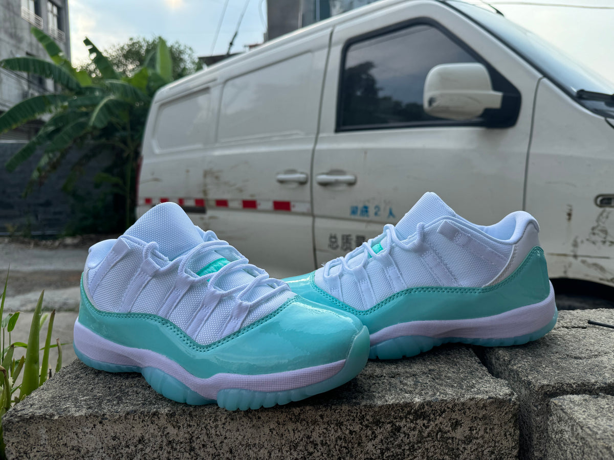 Air Jordan 11 White and Light Green Sneakers