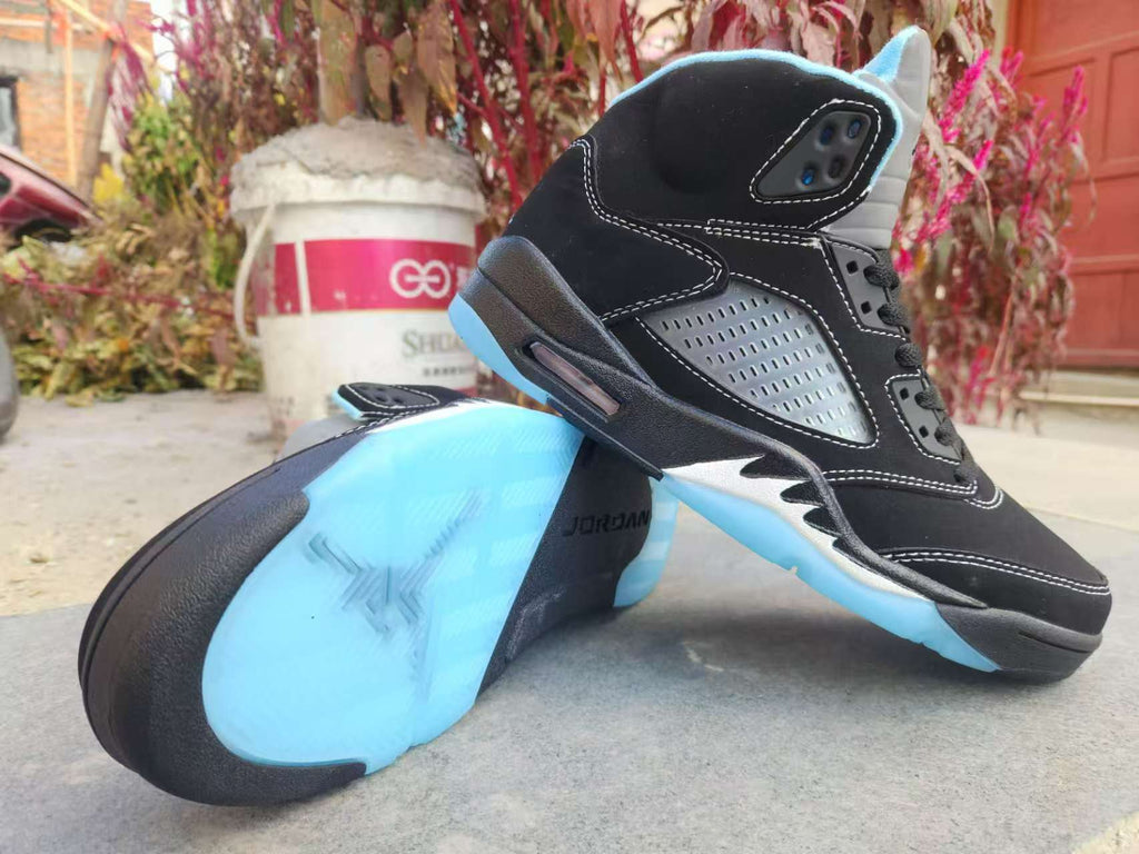 Air Jordan 5 Black and University Blue Sneakers