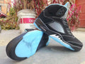 Air Jordan 5 Black and University Blue Sneakers