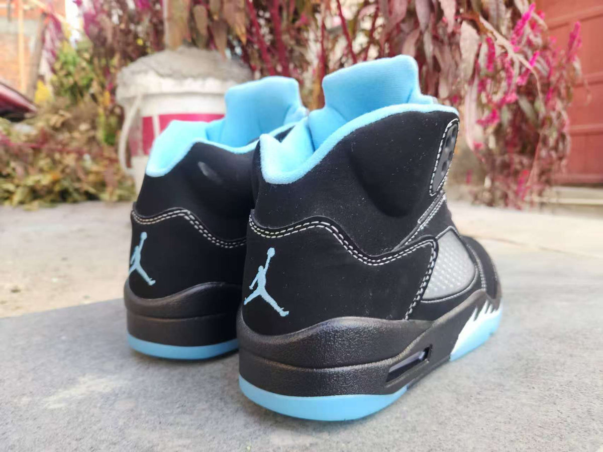 Air Jordan 5 Black and University Blue Sneakers